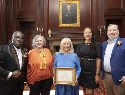 New Peterson Society members pose for a group photo at the Buffalo Club