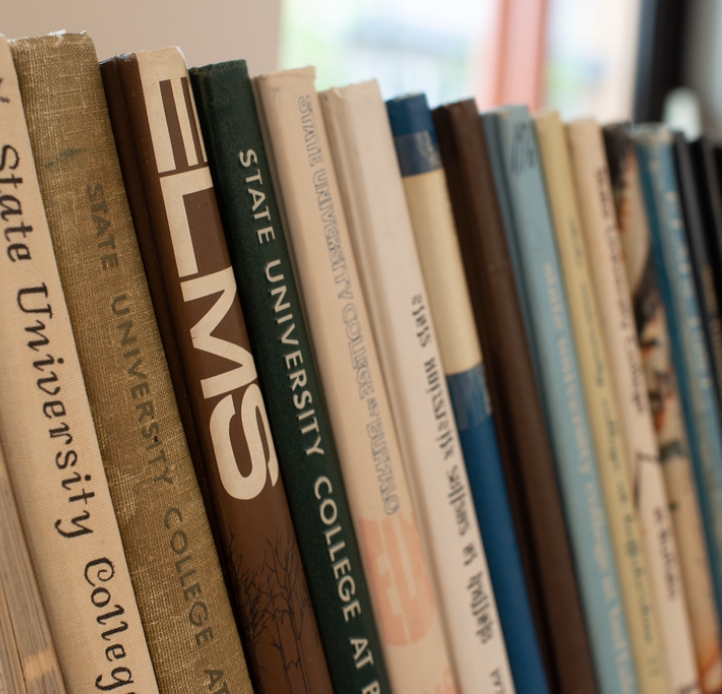 Elms yearbooks in a row