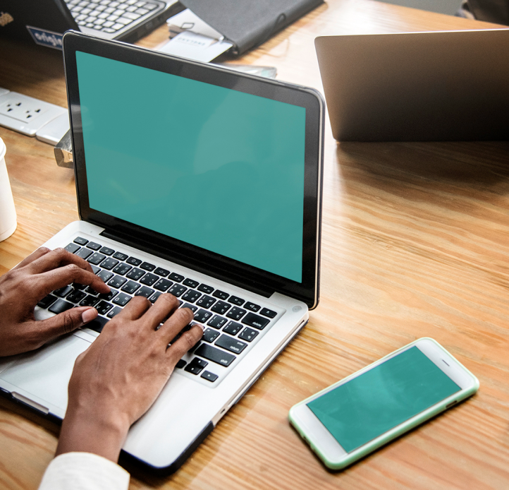 Hands on a laptop